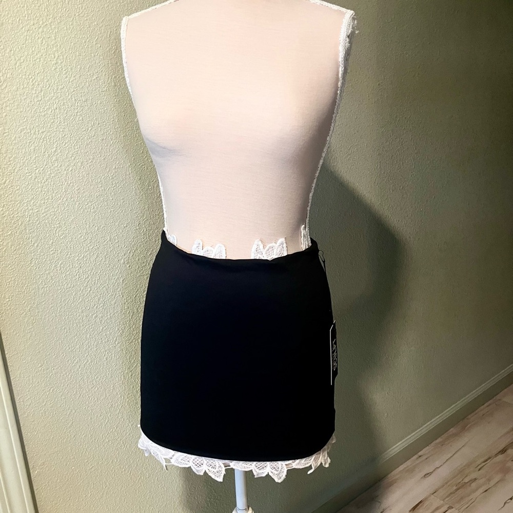 Forever 21 Black Sculpt Mini Skirt (White area/part of mannequin)